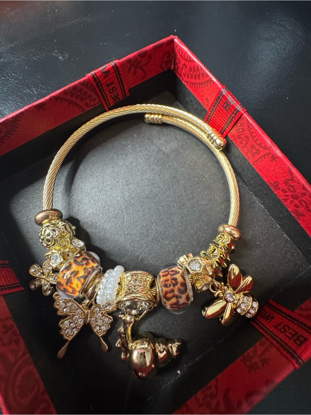 Gold-Tone Charm Bangle Bracelet with Leopard Beads